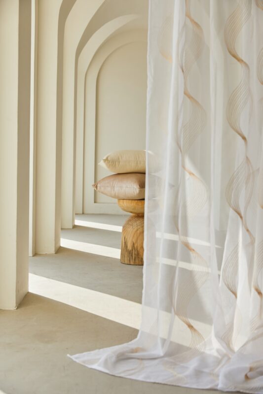 Premium curtain fabric draped in a light-filled room